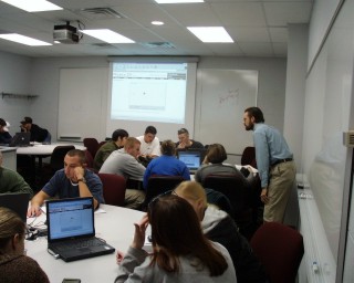 Photo of students working in TCCW251